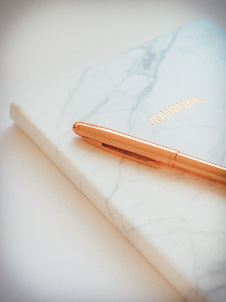 Journaling is a way to stay centered in personal development.